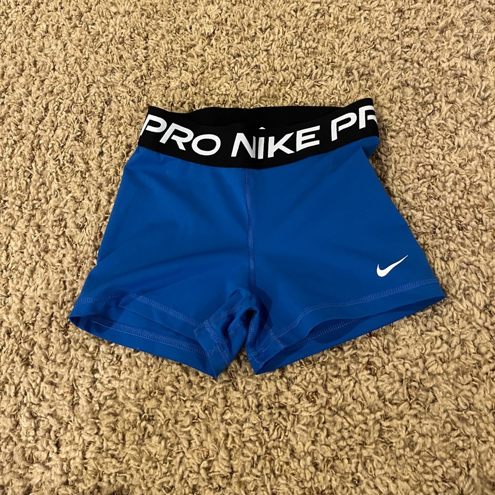 Nike Pro Blue Compression Shorts with Black Waistband and White Logo